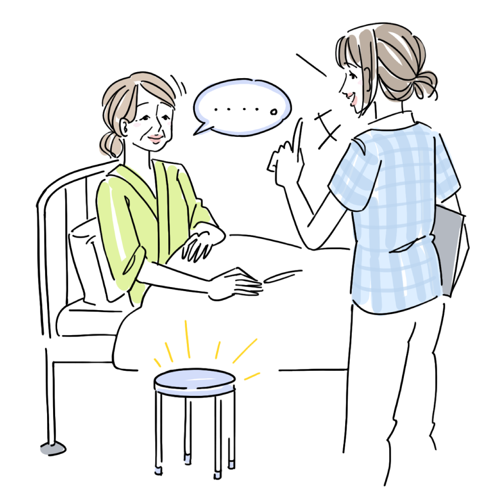ベッドサイドで患者さんと会話